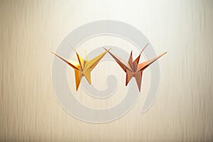 Vibrant Origami Cranes in Mid-Flight - Abstract Rivalry