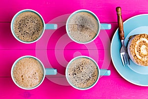 Vibrant overhead image of coffee and cake