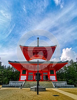 The vibrant red Konpon Daito Pagoda in the Unesco listed Danjo Garan shingon buddhism temple complex in Koyasan, Wakayama, Japan.
