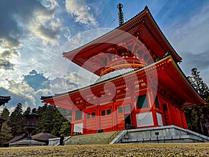 The vibrant red Konpon Daito Pagoda in the Unesco listed Danjo Garan shingon buddhism temple complex in Koyasan, Wakayama, Japan