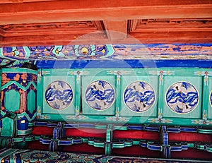 Vibrant roof paintings with cranes in a Chinese taoist temple