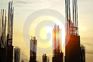 Vibrant and silhouette construction site workers