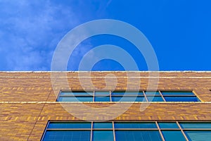 Vibrant sky over building with reflective windows