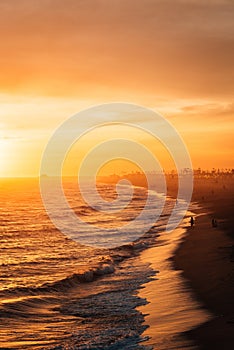 Vibrant sunset over the beach from the Balboa Pier, in Newport Beach, Orange County, California