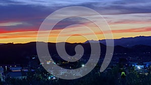 Vibrant sunset time lapse above cityscape of Santa Clarita, California