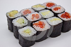 Vibrant Veggie Sushi Maki on White Backdrop