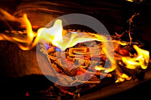 Vibrant Wood Fire in Rustic Outdoor Setting Close-Up