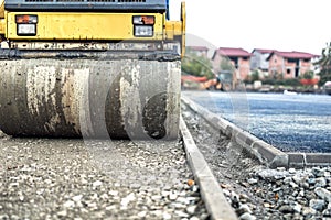 Vibration roller compactor at road construction and reparing asphalt pavement. compactor working