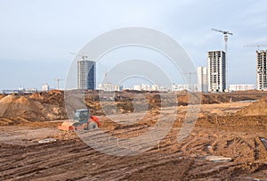 Vibration single-cylinder road roller leveling the ground for the foundation