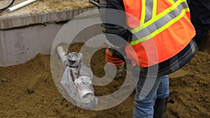 Vibratory hydraulic earth rammer at work