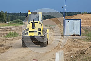 Vibratory roller rides to the construction site