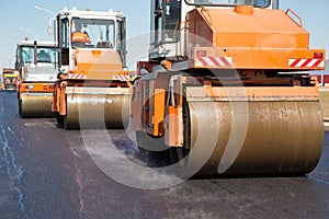 Vibratory rollers machines during road works photo