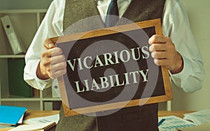 Vicarious liability sign in the hands of financial advisor. photo