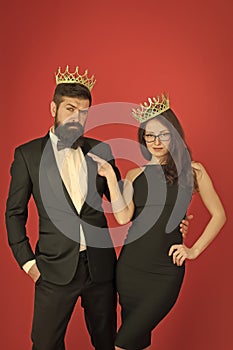 Vice of luxury. Beauty queen and big boss enjoy luxury. Business couple wear luxury crowns. Rich man and woman. Pride