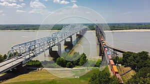 Vicksburg Bridge and Old Vicksburg Bridge with freight train crossing all-steel railroad truss river carrying Interstate 20, U.S.