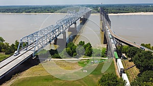 Vicksburg Bridge and Old Vicksburg Bridge with freight train crossing all-steel railroad truss river carrying Interstate 20, U.S.