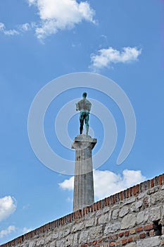 The Victor and cloudy sky