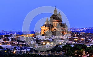 Victoria city, Gozo island, Malta with Rotunda of St. John the Baptist at sunset