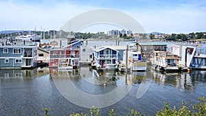 Victoria  city Inner Harbor landscape. Village of colorful floating houses. Fisherman Wharf in Victoria, Vancouver Island,