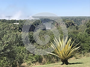 Victoria Falls Bridge and waterfall mist, Zimbabwe