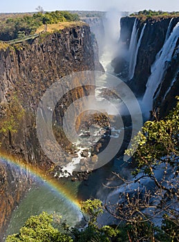 Victoria Falls. A general view with a rainbow. National park. Mosi-oa-Tunya National park. and World Heritage Site. Zambiya. photo