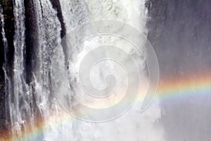 The Victoria falls with rainbow on water