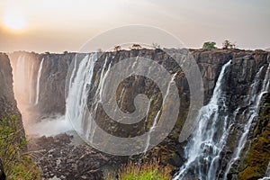 Victoria Falls sunset from Zambia side, red sun