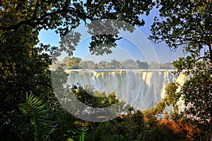 Victoria Falls, waterfall in southern Africa on the Zambezi River at the border between Zambia and Zimbabwe. Landscape in Africa.