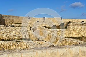 Victoria, Gozo, Malta 02/02/2020 Tourist visting citadel `Citadella` and admiring view
