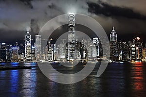 Victoria Harbour, Hong Kong, at night with low clouds