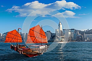 Victoria Harbour with junk ship in Hong Kong