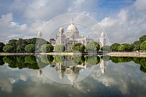 Victoria Memorial architectural monument building museum in Kolkata (Calcutta) with lovely water reflections.