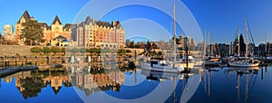 Panorama of Victoria Inner Harbor with Reflection of Empress Hotel in Evening Light, Vancouver Island, British Columbia photo
