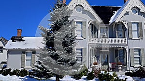 Victorian homes in Canada in fresh winter snowfall.