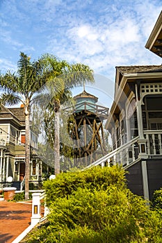 Victorian Homes Beside a Water Tower