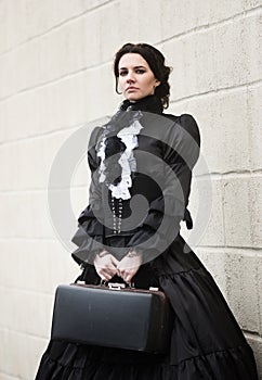 Victorian lady in black.