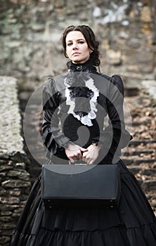 Victorian lady in black.