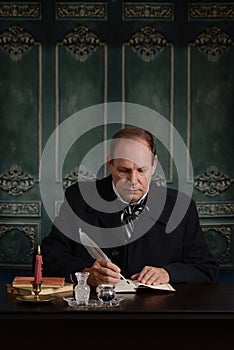 Victorian office worker writing in his ledger