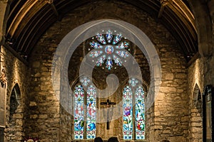Stained glass church window depicting Saints