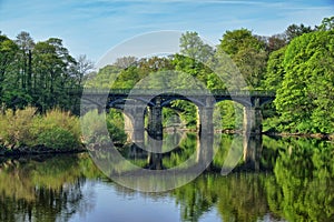 A Victorian style bridge over the River Lune near lancaster.