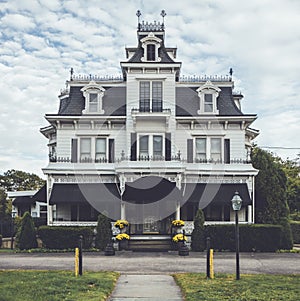 Victorian style funeral home ornate with unique crow`s nest i