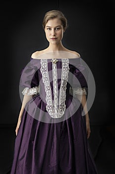 Victorian, 18th century, or renaissance woman in a silk dress photo