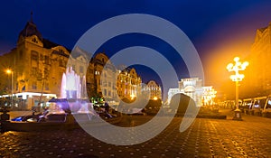 Victoriei Square with colored fountain and National Opera