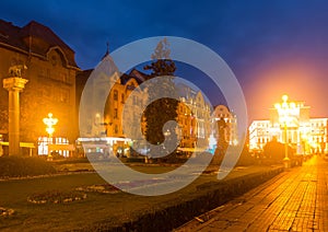 Victoriei Square with National Opera house at dusk