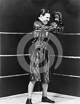 Victorious boxer in ring photo