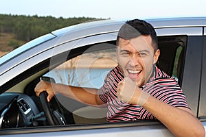 Victorious driver raising his arm