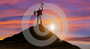 Victory businessman with trophy on top of mountain. Success, Achieving goal, Leadership, Career, Winner, and Business achievement