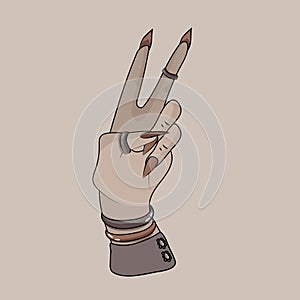 Victory. A gesture of peace. Two fingers. The witch\'s hand. Gothic style. Bracelets,