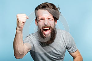 Victory success win gesture excited agitated man