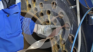 Video 4k resolution. Engineer inspects and repairs gas equipment of boiler room.